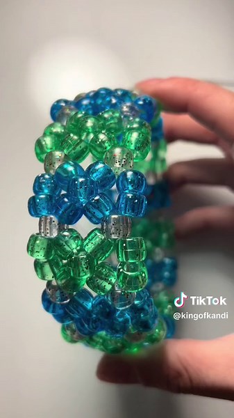 making a big rotating kandi cuff for my shop! i looooove this cuff sm 🙂🙂 #kandi #kandicuff #kandibracelet #kandismallbuisness #kandismallbusiness #rotatingkandicuff #kandirotatingcuff #smallbiz #smallbusinessowner #bigkandicuff #epickandicuff #kandimaking #ravekandi