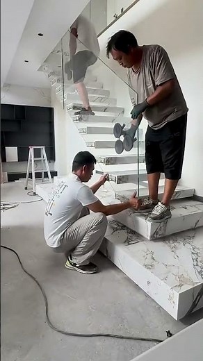 Installing glass to create a step handrail support
