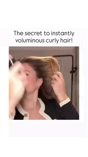 MOVIE FUN 🍿 on Instagram: "This video is a short, sped-up demonstration of a hair-styling technique used to achieve volume, typically a voluminous blowout or a 90s-inspired look.The woman in the video, with blonde, shoulder-length hair, focuses on the crown and top layers of her hair.The Hair-Styling Process• Initial Combing (0:00 - 0:02): The woman first combs a section of her hair away from her face using a fine-toothed, orange comb to ensure it is smooth and lifted.• Initial Hair Spray Appli