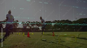 Data points and graphs animation over athletes training on soccer field
