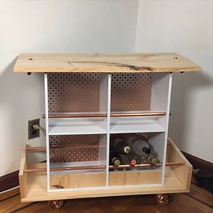 Unbelievable bookshelf bar cart Via Hometalk | Distractify