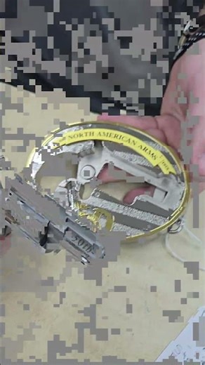 Belt Buckle .22 from North American Arms @ Empire pawnshop in Pasco.