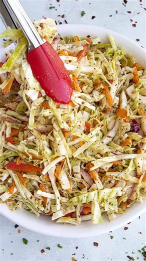 This vinegar coleslaw recipe is a no-mayo coleslaw made with finely shredded cabbage, carrots, bell pepper and onion tossed in a tangy vinaigrette. It's the perfect side dish. >> Comment “RECIPE" and I'll send this recipe straight to your DMs! 🥳 RECIPE: https://www.chilipeppermadness.com/recipes/vinegar-coleslaw/ ⭐️REMEMBER ALL RECIPES ARE ON OUR WEBSITE AT CHILIPEPPERMADNESS.COM!⭐️ #goodeats #hereismyfood #thekitchen #recipeoftheweek #recipesharing #recipe #foodpic #chef #foodpics #foodphotogr