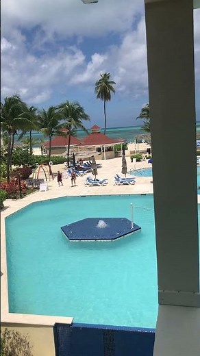 View of Breezes Resort & Spa Swimming Pool Area in Nassau, Bahamas