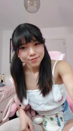 Asian diaper cutie making cute faces
