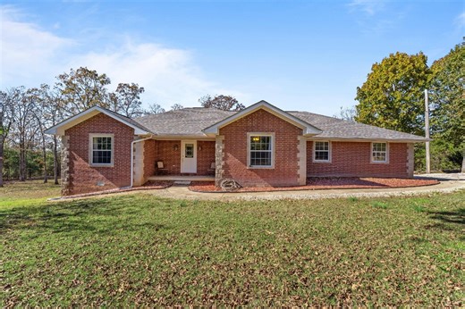 NEW LISTING: 371 CR 1434, Mountain Home, AR 72653 Enjoy the perfect blend of privacy and convenience with this beautiful 3-bedroom, 2-bath all-brick home built in 2002, sitting on 15 peaceful acres surrounded by woods yet offering a spacious, open yard. This well-kept country retreat features comfortable living spaces filled with natural light, along with a detached shop and mini garage ideal for projects, storage, or hobbies. You’ll love the quiet country setting while still being close to ever