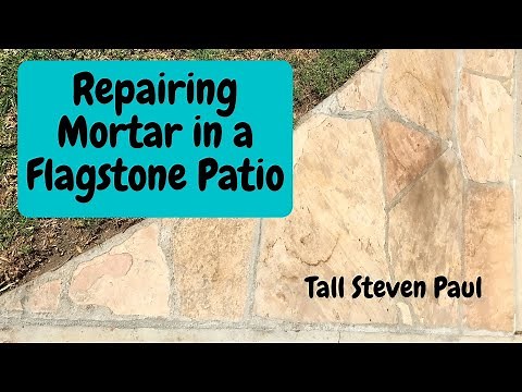Repairing broken and replacing missing mortar in a section of my flagstone patio.