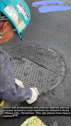 Precision asphalt paving and finishing around a road manhole #asphalt #construction #roadworks