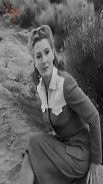 John Wayne, alone with a big heavy suitcase, A Lady Takes A Chance, 1943