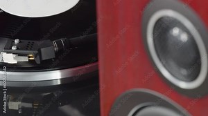 Record player needle falls on the vinyl record 02
