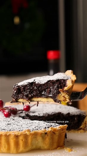 Rosie Brown on Instagram: "Giant Mocha Brownie Mince Pie ✨ Ad | I don’t think Christmas is complete without a mince pie. This is my giant mocha brownie mince pie and it’d just as delightful as it sounds. Made with every bakers secret ingredient, @campcoffeeuk Chicory& Coffee Essence, it’s got a rich velvety mocha flavour with a blend of dried fruits in the middle from fruit mincemeat. Base: 250g plain flour 30g caster sugar 115g dairy free butter 1 tbsp ice cold water Brownie filling: 120g dairy