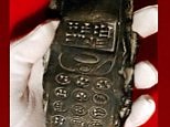 Is this '800 year old mobile phone' proof of alien life?