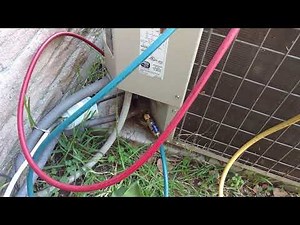 Fieldpiece MR45 recovery machine in action.