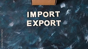 Import Export text next to open parcel box, global business concept with camera tilting