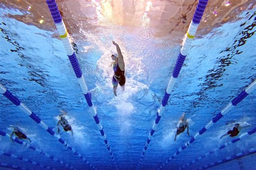 What are the Enhanced Games and why will athletes participating in the event be banned by World Aquatics?