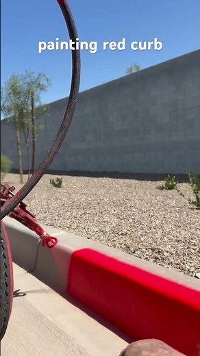 painting red fire lane curb #construction #satisfying #paint #painting #shorts