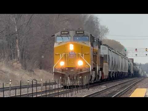 Soo Line hopper and ex-Amtrak boxcar, MOW, two high priority Z intermodals meet