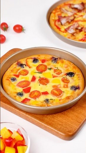 🍕🧀A veggie pizza loaded with fresh vegetables, gooey melted cheese, and a homemade crust🌽🍅