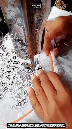 Sewing lace fabric on workshop site with accurate working tool sewing machine