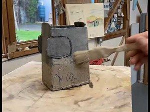 Painting a black clay slab pot