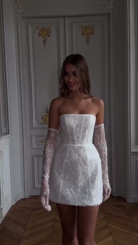 Rosie Etienne Bridal on Instagram: "The Eva Bridal Mini Dress boasts a captivating design crafted from beautiful French lace, meticulously hand-embellished with delicate beading that catches and reflects the light, creating a mesmerizing shimmer with every step ✨ #2024bride #2025bride"