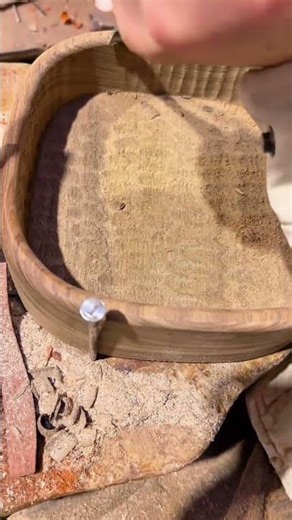 Carving Intricate Textures on the Inner Surface of a Curved Wooden Frame Using a Sharp Gouge