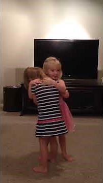 3 kids hugging