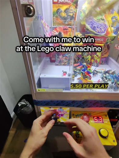 Winning at the LEGO Claw Machine: A Valentine's Day Adventure