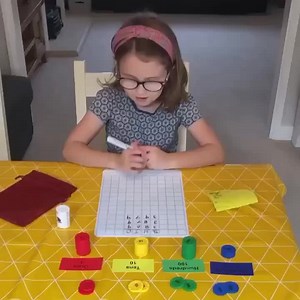 Here’s Jess using Number Stacks to revise place value. Adding 1s, 10s & 100s to a 4-digit number using her colourful stackable counters to help! | Number Stacks