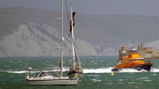 Kite surfer dies after being 'blown into side of yacht' at popular UK beach