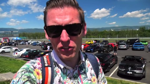 Artificial intelligence robot dog blocks supercar driver