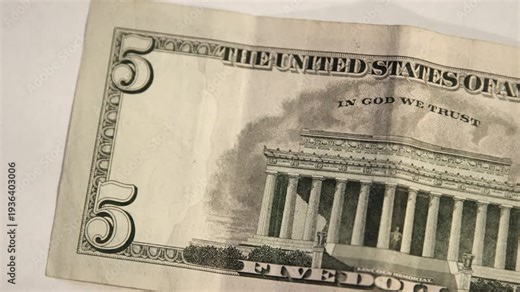 Five US Dollar Bill. Close up of USA, American currency. Back side of the 5 $ dollar bill