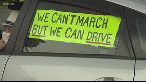 Protesters trade marching for driving in caravan against racial injustice