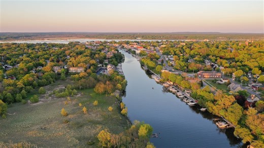 Fiery reds, churning blues collide in aerial fall color tours over Lake Michigan