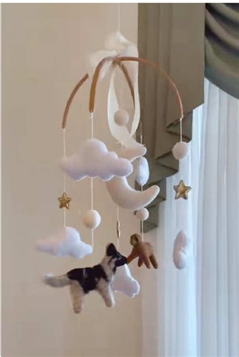 These aren’t *just* dogs… they’re first babies. 🐾🤍 The ones who guarded your bump, waited by the crib, and already love this little human more than life. A German Shepherd mix a red retriever, hand-stitched into a nursery keepsake that tells *your* family’s story. Because when baby looks up, they should see the ones who’ve always been there. 🐶✨ Custom dog baby mobiles are made in **very limited spots** and they fill fast. If your heart just fluttered… that’s your sign. Order now before this r