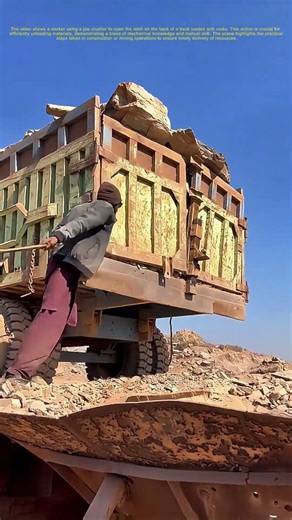 Crushing Barriers: How a Worker Unlocks a Truck's Load with Precision