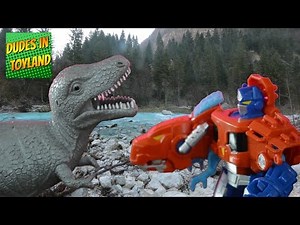 Dinosaur toys battling Rescue Bots Transformers toys