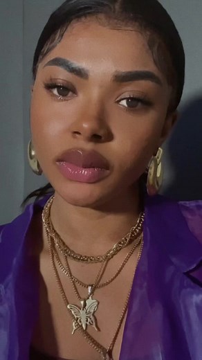 Stylish Jewelry Showcase with Shiny Purple Jacket