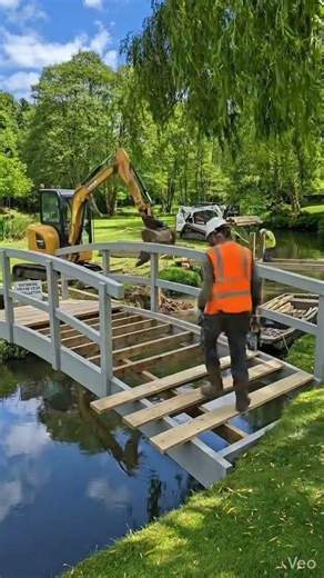 Building Wooden Bridge on Canal