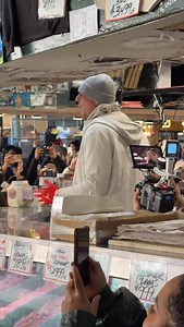 Rob Gronkowski -Gronk at Pike Place Market immediately drafted into the fish toss. Tourists screaming. Phones everywhere. Zero warning. Also in the building: Michael Strahan and Terry Bradshaw! Seattle Seahawks game tomorrow and Seattle is already doing its thing. 🐟🏈 #PikePlaceMarket #Seattle #Seahawks #RobGronkowski #MichaelStrahan | Marco Collins