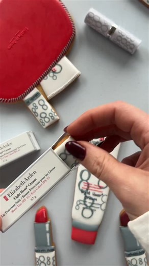 Baked by Steph on Instagram: "You’ve never seen a sweeter beauty bag! 💅 I had so much fun transforming these ICONIC Elizabeth Arden products into cookies. I’m already a big fan of the Eight Hour Cream Skin Protectant but now I’m also obsessed with the Lip Protectant Sticks. Plum is definitely my colour! ♥️ @ElizabethArden ✨ #ad"