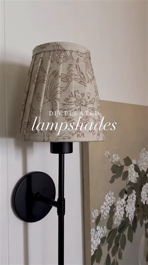 Here’s a quick look at how I made my DIY pleated lampshades! This was such a fun, easy, and satisfying project, and I’m already planning to do another pair soon for another spot in our house. I used these shades for my new @pridoladesigns wireless sconces in the living room, and this was just about the easiest custom lighting project ever. These sconces require no hardwiring and come with rechargeable LED bulbs, making installation almost effortless. They bring such a lovely glow to this room an