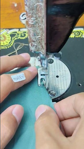 Sewing the edge of the fabric using a hemming foot