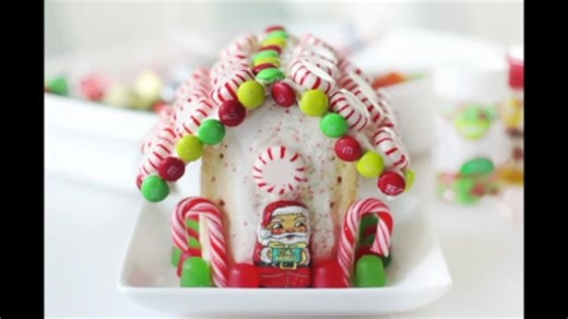 This Pop Tart gingerbread house is so fun to decorate and perfect for the holidays! Once you make a gingerbread house out of Pop Tarts you'll never go back to graham crackers again. TUTORIAL: https://gluesticksblog.com/make-a-pop-tart-gingerbread-house-video/ | Gluesticks