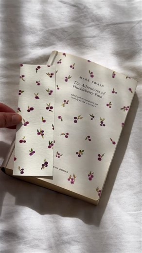 Kan on Instagram: "A little huckleberry watercolour for my book ✨ Tip: Slip a piece of scrap paper behind the page you’re painting so it doesn’t soak through to the other pages. #bookstagram #bookcover #bookaholic #oldbook #books #readmorebooks #readersofinstagram"