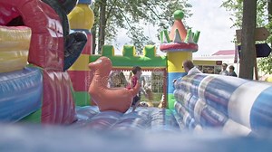 Kids Jump at Inflatable Playground Stock Footage - Video of girl, pair: 95705022