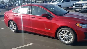 For Sale: Pre-Owned 2019 Ford Fusion Hybrid SE Take a Test Drive... Call or Direct Message Us Used 2019 Ford Fusion Hybrid SE Exterior: Red Interior: Black Mileage: 88,399 ** One Owner Clean CarFax ** No Accidents Engine: 2.0L V4 Transmission: Continuously Variable Automatic Backup Camera Remote Keyless Entry 17" Alloy Wheels Apple Carplay Navigation and more... Call, Direct Message us, or visit our Website for Pricing and More Details... VIN: 3FA6P0LU0KR188404 Stock: PS66978 http://www.crowndod