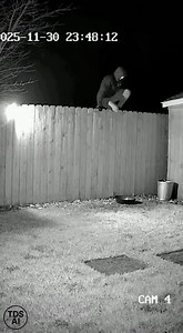 Security Cam Captures German Shepherd Taking Down Burglar: Security camera footage from a quiet suburban home in Tennessee shows the dramatic moment a suspected burglar climbs the back fence in an attempted break-in — only to be met by the homeowner’s German Shepherd. The intruder jumps down into the yard, unaware he’s seconds from trouble. Within moments, the dog sprints into frame, launching toward the suspect and forcing him to flee in panic. Authorities say the homeowner’s quick-thinking can