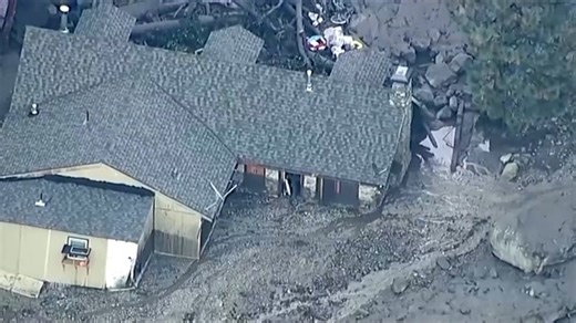 Mudslide buries houses and cars after heavy rain in California