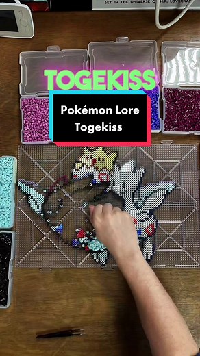 Pokémon lore explained number 468, Togekiss! The whole evolution line is done and i love how this pokemon perler bead pattern turned out. Togekiss's presence is often considered a sign of good fortune and positive energy. So hopefully this pixel perler bead art does the same 😁 Join the fun! Follow me for daily videos of Pokémon and perler bead content, including Pokémon quizzes, tutorials, Pokémon lore, and much more. Plus, I turn your comments into stunning perler bead designs! Don't miss out 